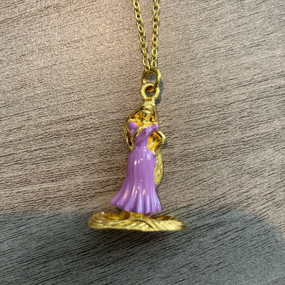 Gold Disney Repunzel necklace.